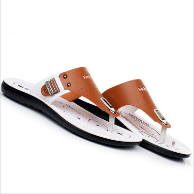 Scarpe da sole in pelle da uomo realizzate a mano