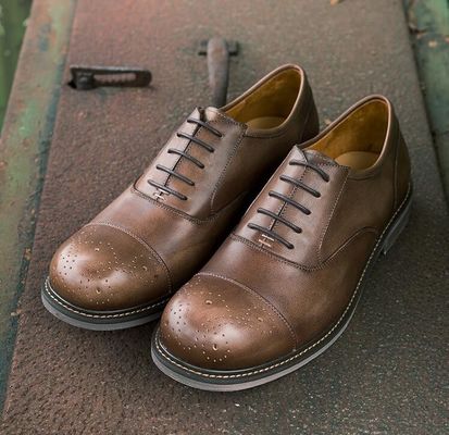 Calzature da uomo con punta rotonda nera Calzature da lavoro traspiranti Calzature da lavoro casual